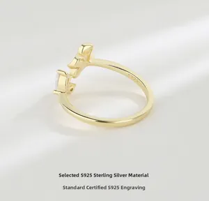 Macro shot showing S925 sterling silver hallmark engraving on golden adjustable flower ring