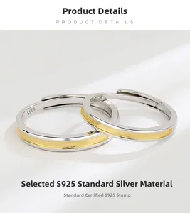 Macro view of S925 sterling silver couple rings showing gold frosted inlay and S925 hallmark
