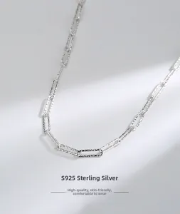 Detail of S925 sterling silver paperclip chain with textured Italian engraved finish
