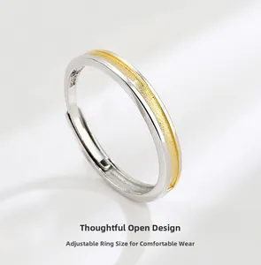 Detail of S925 sterling silver ring with adjustable open band and gold matte inlay