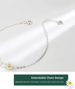 Detailed view of S925 sterling silver daisy bracelet with adjustable heart tail chain