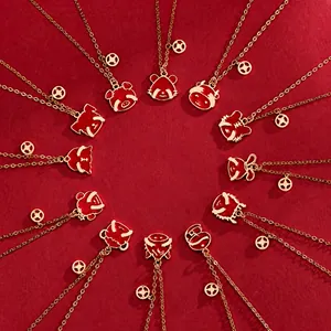 Detailed set of 12 Chinese zodiac pendants with red enamel and gold chain decoration