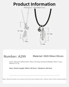 Close-up of S925 silver feather couple necklaces with zircon stones and detailed dimensions