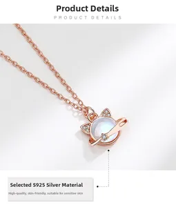 Detail of rose gold S925 sterling silver cat planet necklace with moonstone and diamonds