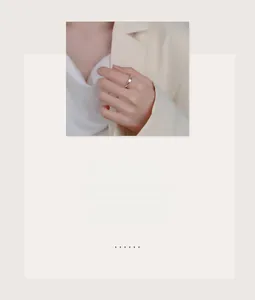 Close-up of a minimalist S925 sterling silver irregular ring with a round white stone