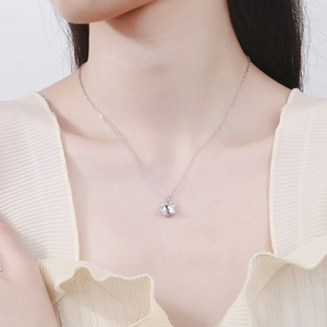S925 sterling silver cat planet necklace featuring moonstone pendant on female model