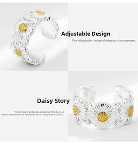Macro detail of a 925 sterling silver daisy ring with adjustable open band and golden center