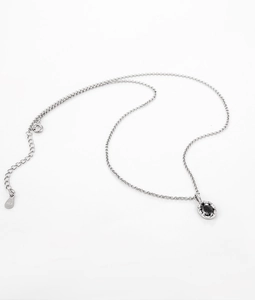 Detailed close-up of S925 sterling silver necklace with oval black zircon pendant charm