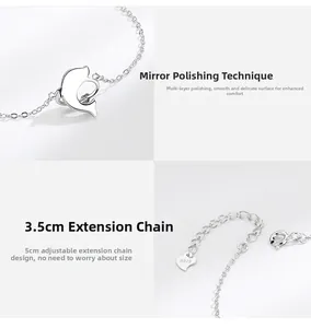 Detail view of S925 sterling silver dolphin charm bracelet with adjustable chain and clasp