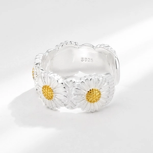 S925 sterling silver daisy open ring with yellow centers on white background