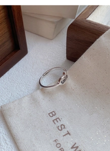 Detail of S925 sterling silver heart ring with Smile engraving and S925 hallmark stamp