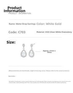 Detailed view of S925 silver teardrop earrings with chalcedony and small diamonds