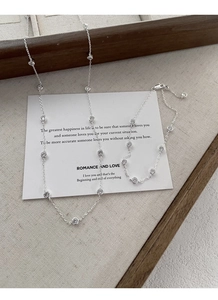 Detail view of S925 sterling silver chain necklace with sparkling zircon bubble stones