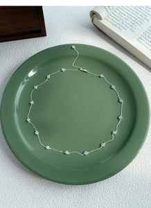 Detailed close-up of S925 sterling silver chain necklace with inlaid round cubic zirconia