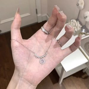 S925 sterling silver smile necklace with round pink gemstone and pavé zircon pendant