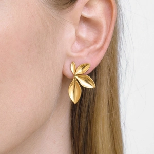 Elegant gold petal stud earrings with 3D leaf design shown on model for a minimalist style