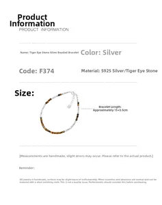 Detail view of S925 silver bracelet with tiger eye beads and irregular silver pieces