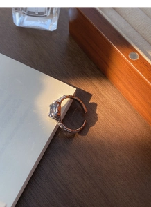 Detail of S925 sterling silver ring featuring a textured band and a sparkling zircon stone