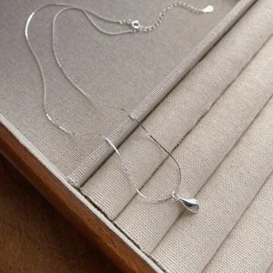 Minimalist S925 sterling silver water drop necklace with octagram star detail on box chain