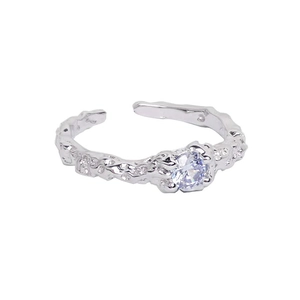 Irregular textured S925 sterling silver open ring with a brilliant round zircon stone