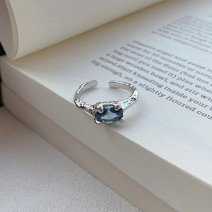 Irregular S925 sterling silver open ring with blue oval gemstone and lava texture