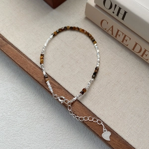 S925 sterling silver tiger eye stone bracelet with heart pendant and lobster clasp detail