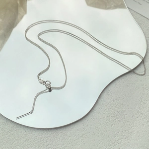 Minimalist S925 sterling silver chain necklace with straight pendant on mirror surface