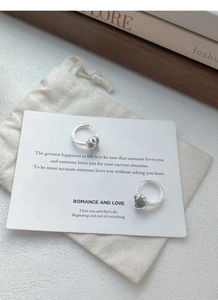 Detail view of S925 sterling silver hoop earrings featuring natural moonstone gemstones