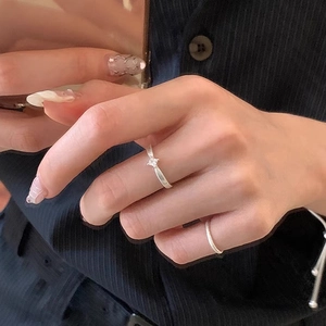 Minimalist S925 sterling silver ring with square zircon stone worn on model hand