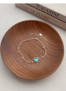 Detailed macro view of S925 sterling silver heart-shaped moonstone double-layer chain