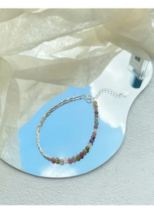 Detail view of S925 sterling silver tourmaline beaded bracelet with adjustable heart tag