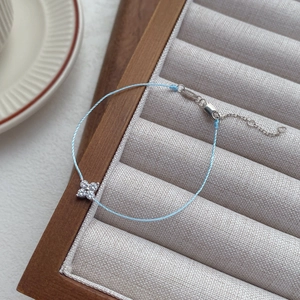 S925 silver four-leaf clover light blue cord bracelet with sparkling cubic zirconia