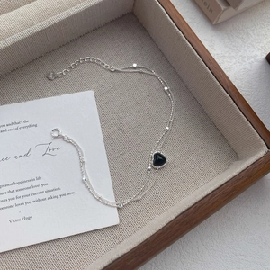 Elegant S925 sterling silver double-layer bracelet with black heart charm and beads