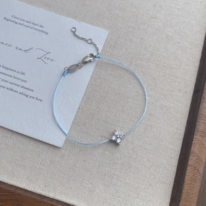 S925 sterling silver light blue rope bracelet with sparkling clover zircon pendant