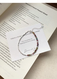 Detailed view of S925 sterling silver beads and multi-color tourmaline beaded bracelet
