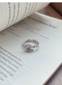 Close-up of S925 silver snake ring with marquise zircon and hammered texture
