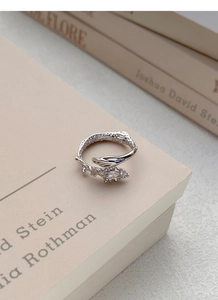 Detailed view of S925 silver snake ring with marquise zircon and coral texture