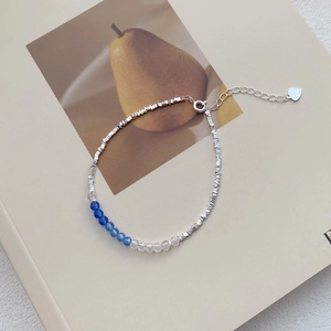 S925 sterling silver beaded bracelet with irregular blue crystals and heart charm