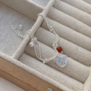 S925 sterling silver double-layer bracelet with red agate bear charm and small bell