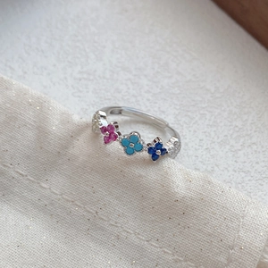 S925 silver ring featuring three colorful four-leaf clovers set with sparkling zircons