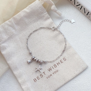 Bracelet élégant en argent sterling S925 avec breloques cheval et sac d'argent sur pochette