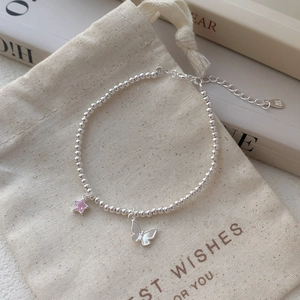 Bracelet en argent S999 avec perles, pierre étoile rose et pendentif papillon sur sac cadeau