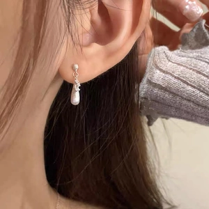 S925 sterling silver teardrop earrings featuring brushed texture and cubic zirconia accents