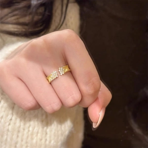 Vintage S925 silver gold-plated ring with double-row zircon stones on a model's hand