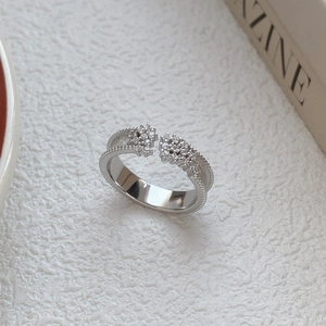 Elegant S925 silver adjustable ring with brushed finish and zircon star accents