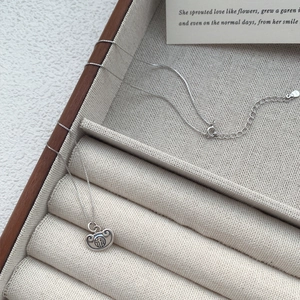 Retro S925 sterling silver Ruyi lock necklace with Fu character on a jewelry box