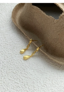 Detailed view of matte brushed S925 silver water drop earrings with zircon insets