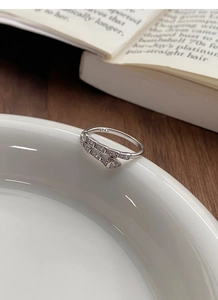 Macro shot of S925 sterling silver hallmark inside the snake scale pave set ring