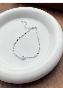 Detailed view of S925 sterling silver bracelet with sparkling zircon and lobster clasp