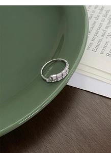 Detailed close-up of S925 sterling silver snake ring showing the S925 hallmark and zircon stones